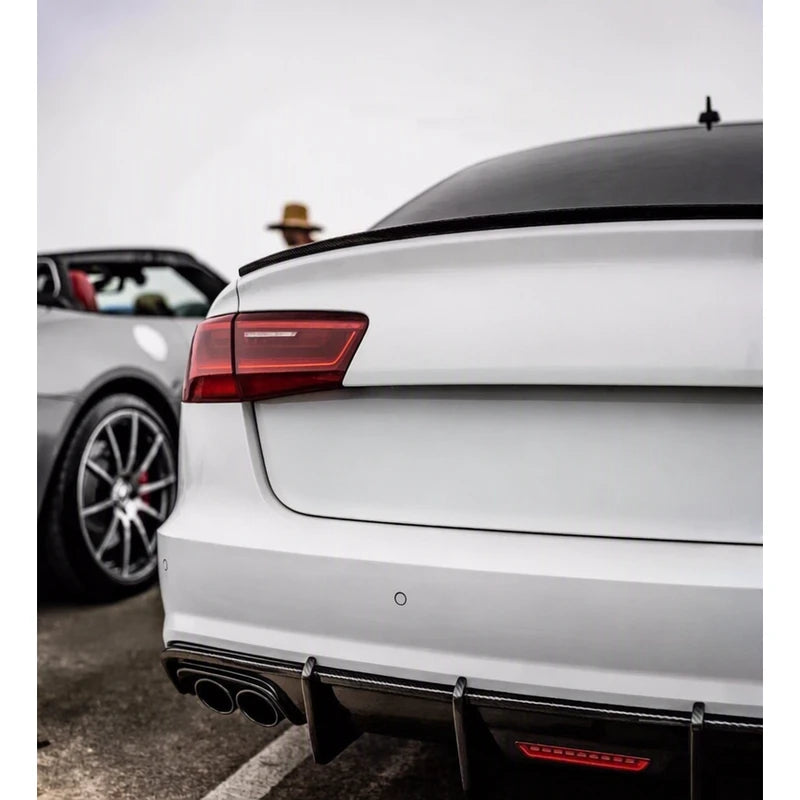 S6 Style carbon fiber trunk spoiler installed on white Audi A6 - rear view
