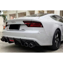 Carbon fiber rear diffuser installed on white Audi A7 - rear view