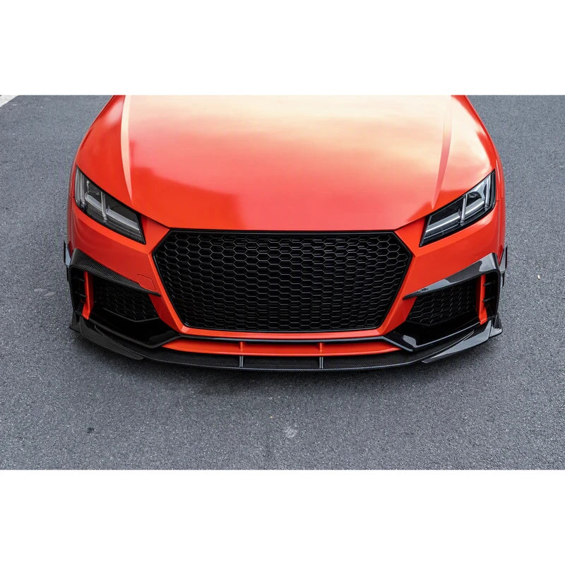 Carbon fiber front lip splitter installed on orange Audi TT RS - front three-quarter view