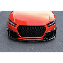 Carbon fiber front lip splitter installed on orange Audi TT RS - front three-quarter view
