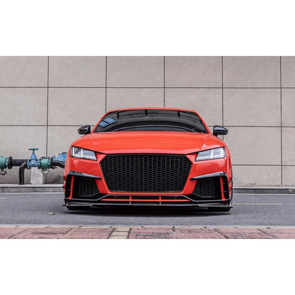 Carbon fiber front lip splitter installed on orange Audi TT RS - front view