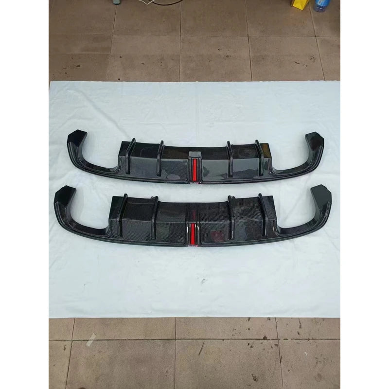 Two carbon fiber rear diffusers stacked - packaging view