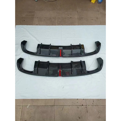 Two carbon fiber rear diffusers stacked - packaging view