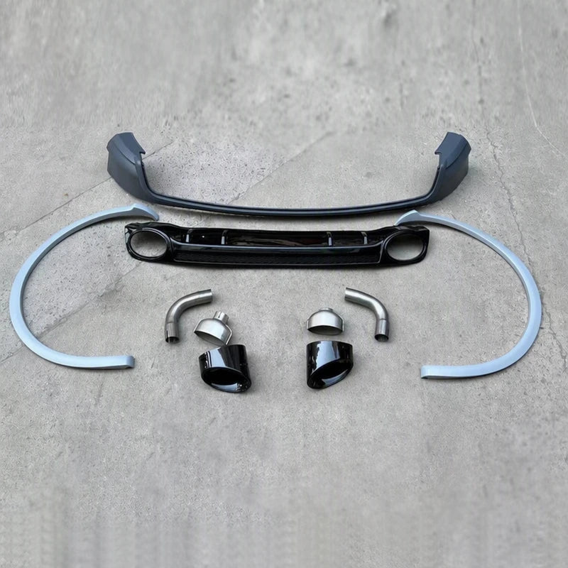 Audi Q5 RSQ5 Style rear diffuser parts layout on concrete