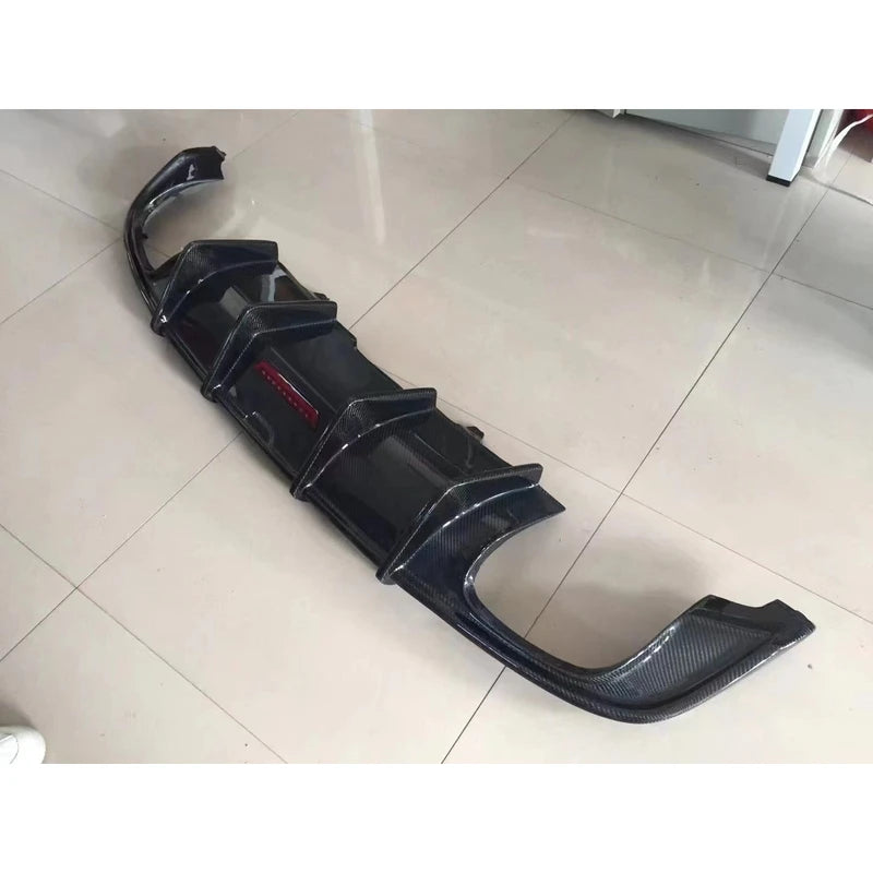 Carbon fiber rear diffuser on tiled floor - overhead detail