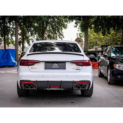 Carbon fiber rear diffuser installed on white Audi A4 - rear view