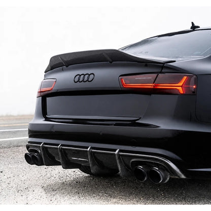 Carbon fiber rear diffuser installed on black Audi A6 - rear view
