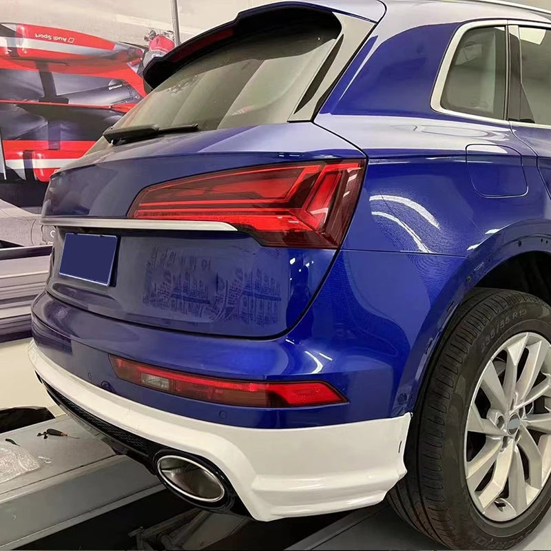 RSQ5 Style rear diffuser installed on blue Audi Q5 - three-quarter view