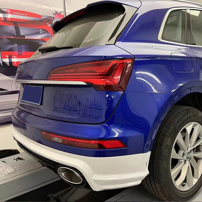 RSQ5 Style rear diffuser installed on blue Audi Q5 - three-quarter view