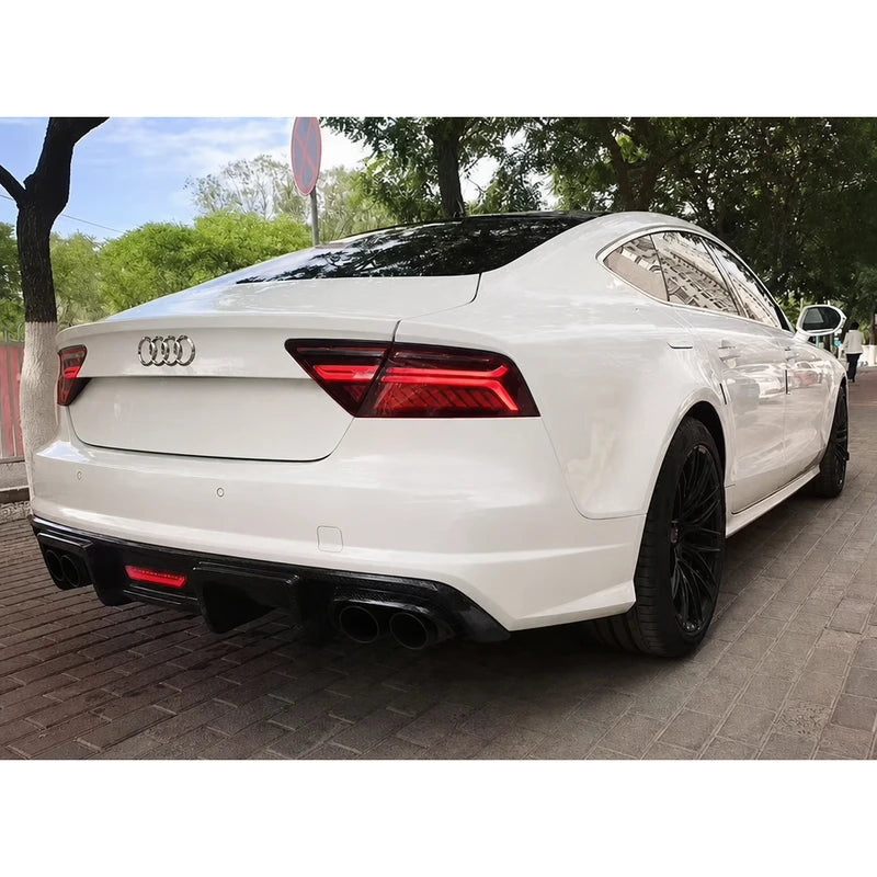 Carbon fiber rear diffuser installed on white Audi A7 - rear view