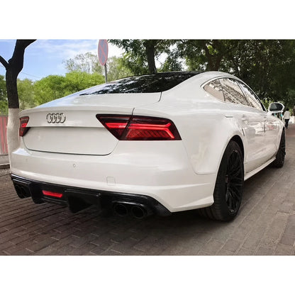 Carbon fiber rear diffuser installed on white Audi A7 - rear view