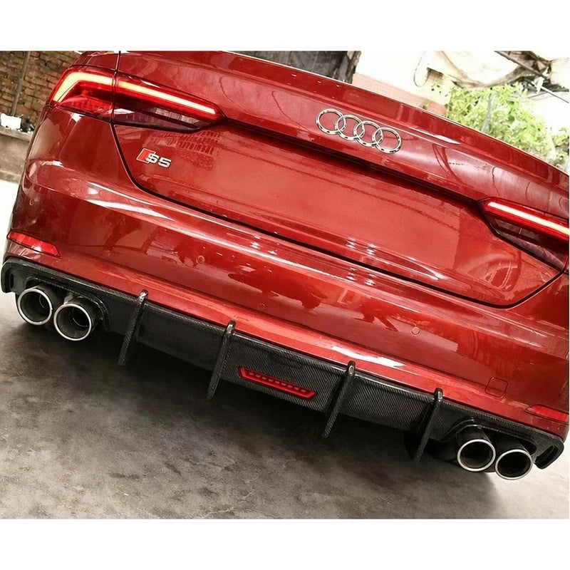 Carbon fiber rear diffuser installed on red Audi A5 - angled rear view